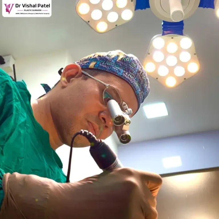 Best Plastic Surgeon in Mumbai - Dr Vishal Patel at his clinic performing surgery