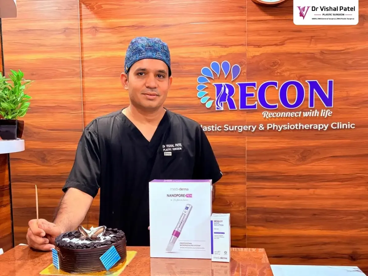 Dr. Vishal Patel at reception desk of Recon Plastic Surgery & Physiotherapy Clinic