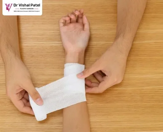 A Hand Wrapped in Surgical Dressing.
