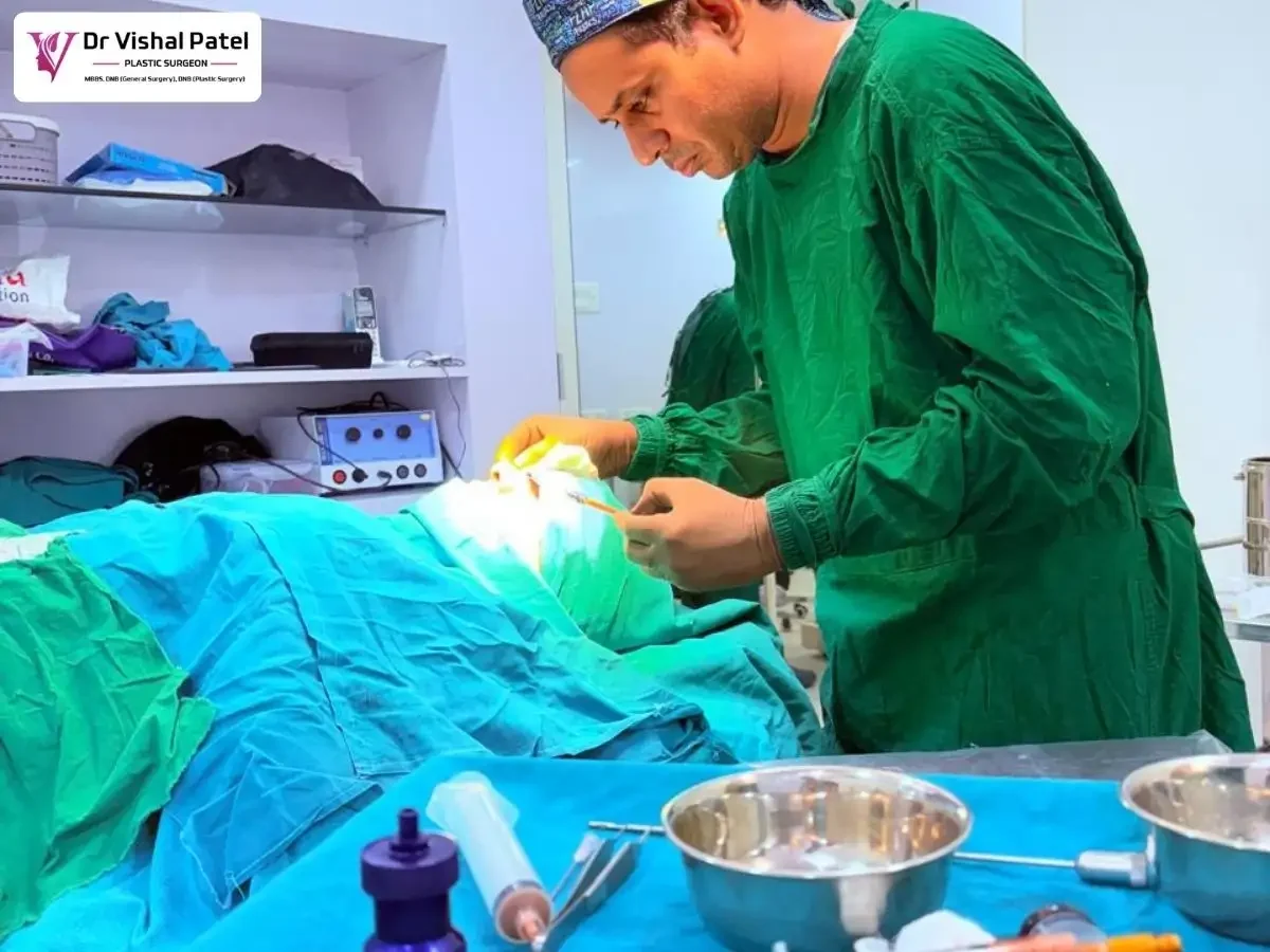 Dr. Vishal Patel injecting fat in women's face.