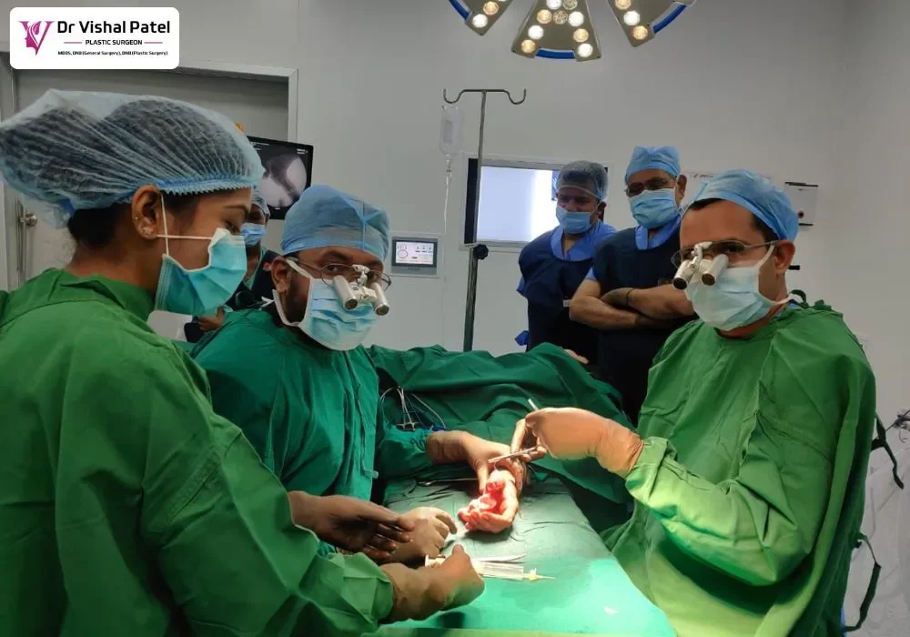 Dr. Vishal Patel performing hand cut surgery in Mumbai