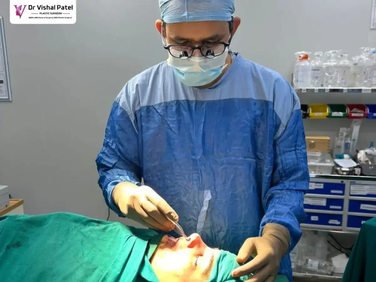 Dr. Vishal holding nose tip during an operation in Mumbai, India.